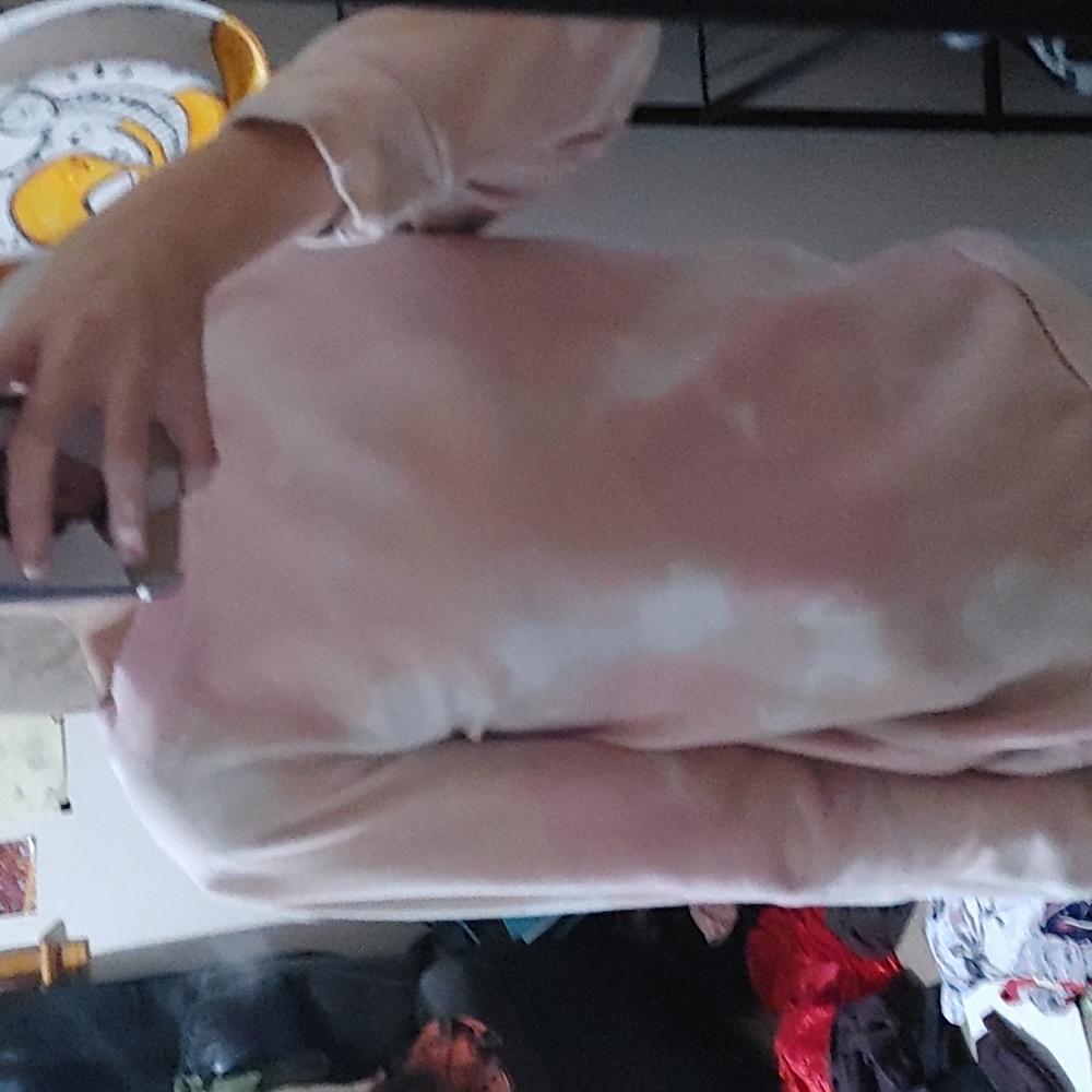 A pink tye dye sweater